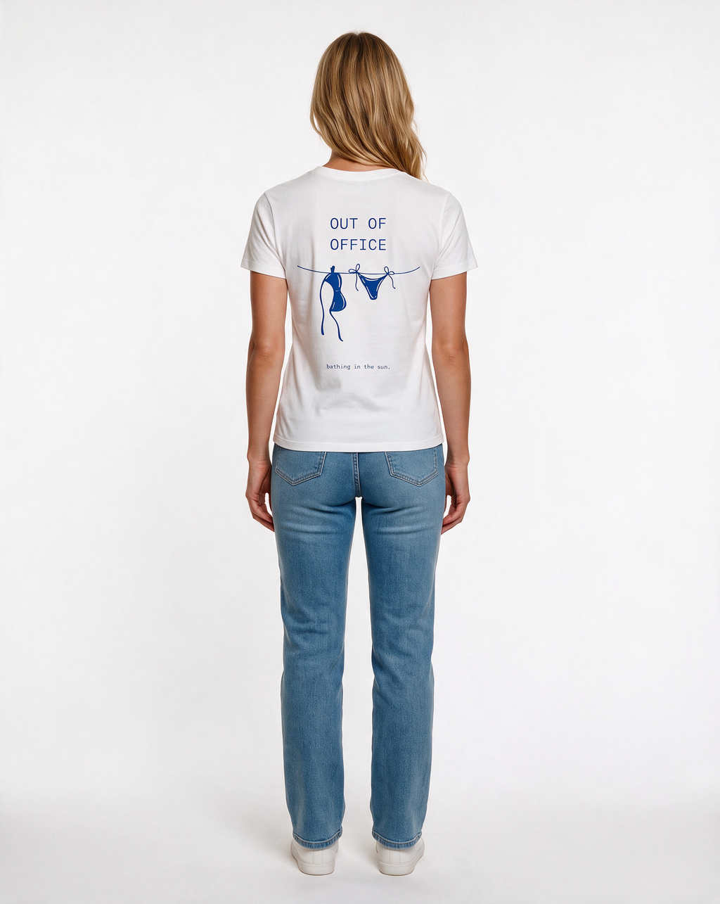 OUT OF OFFICE oversized graphic tee on model, studio lifestyle photograph, back print