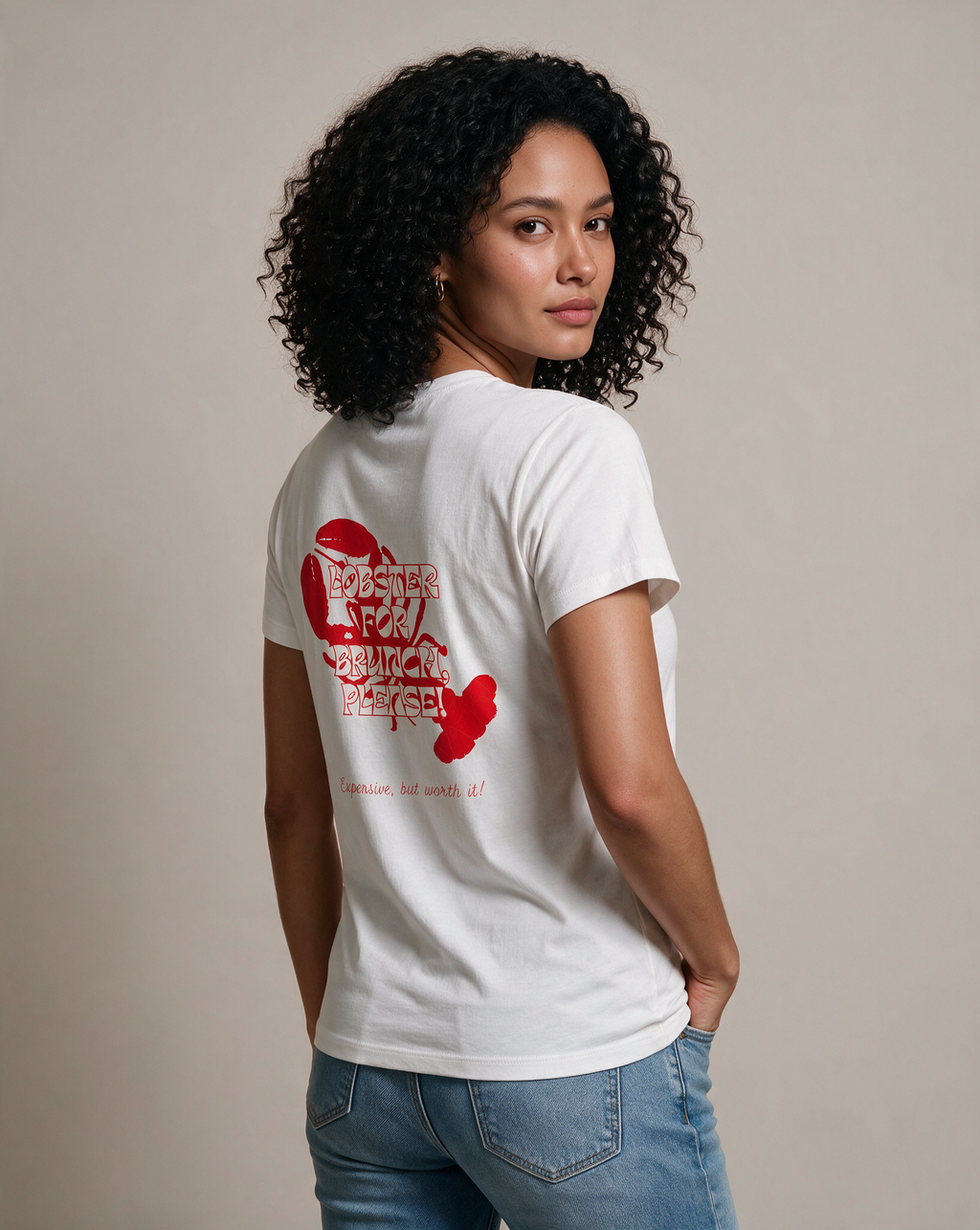 EXPENSIVE BRUNCH oversized graphic tee on model, studio lifestyle photograph, three-quarter back