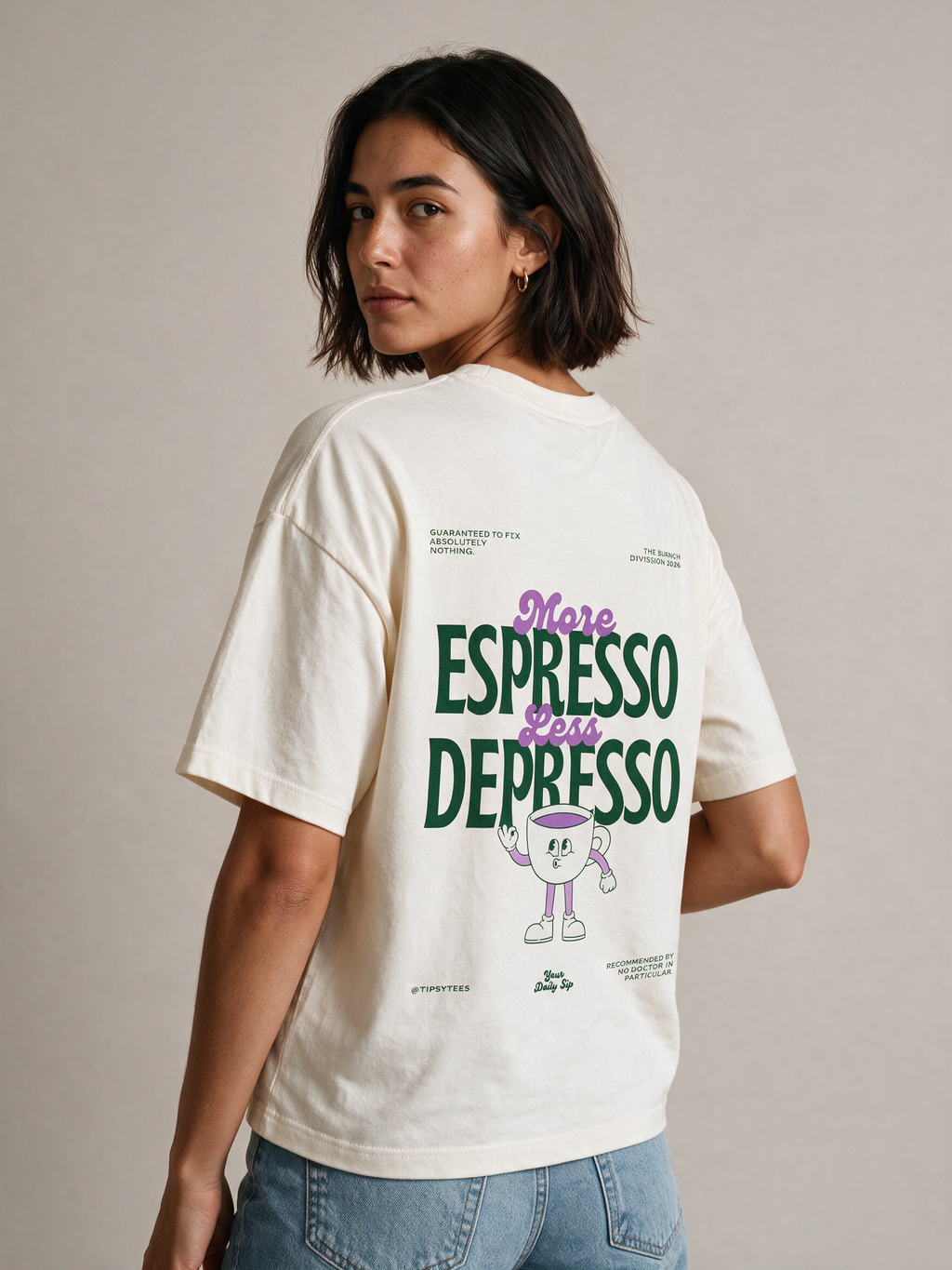 MORE ESPRESSO LESS DEPRESSO oversized graphic tee on model, studio lifestyle photograph, three-quarter back