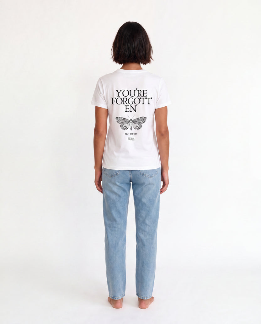 YOU'RE FORGOTTEN oversized graphic tee on model, studio lifestyle photograph, back print