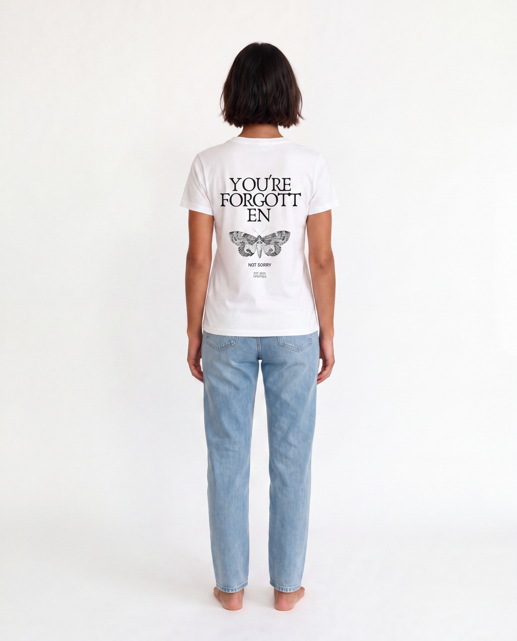 YOU'RE FORGOTTEN oversized graphic tee on model, studio lifestyle photograph, back print